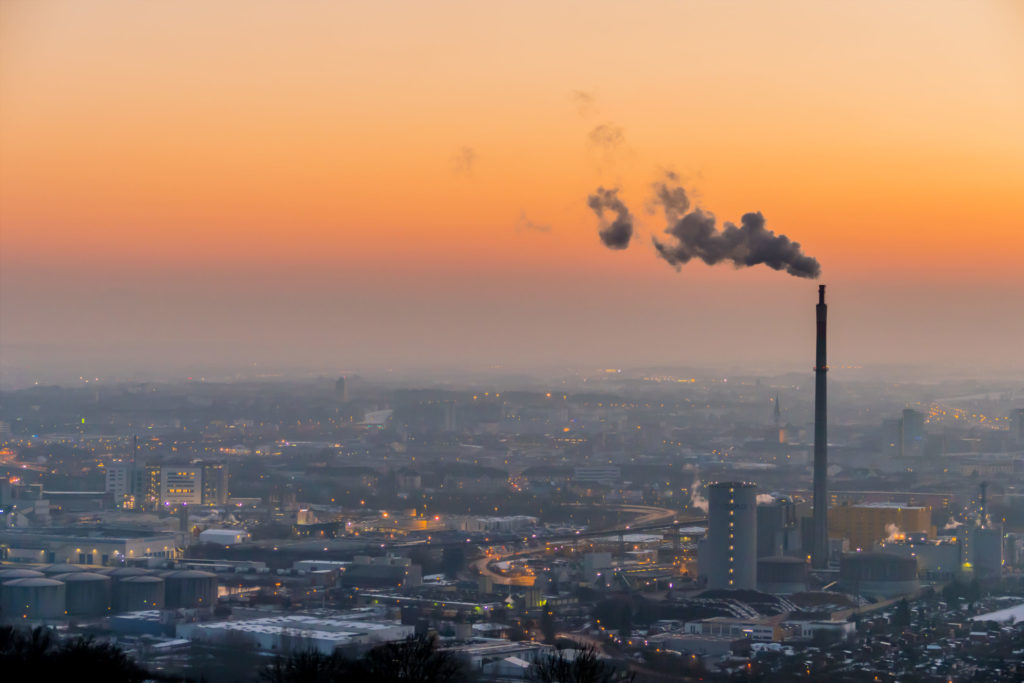 smoking chimneys in the industrial zone in linz, austria, upper austria